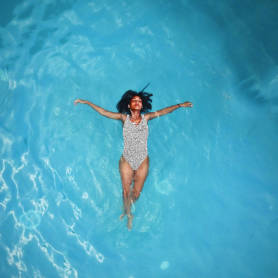 Instagram post template featuring woman floating freely in water